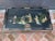 Lovely Vintage Black Lacquer Chinoiserie Coffee Table. The decorative scene features mother of pearl inlay, paint and...