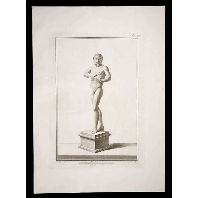 Ancient Roman statue, from the series "Antiquities of Herculaneum", is an original etching on paper realized by Carlo...