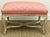 An 18th c. French Regence Carved Wood Stool with Split Hoofs c.1740, with an Old Ivory Gesso Painted Finish and Serpentine...
