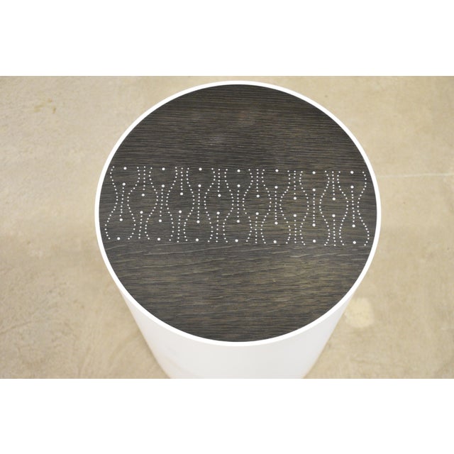 A modern ebonized oak and inlay nail side table end table with a white drum base designed by Peter Sandback. Made in USA....