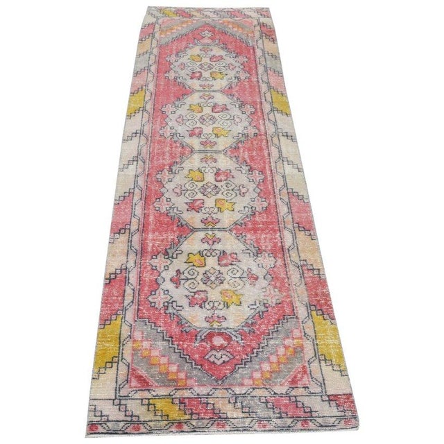 Hand-knotted with care using traditional rug-making techniques, this wool rug blends timeless craftsmanship with a modern...