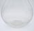 Mid-century blown transparent glass vase filled with effervescent bubbles that rise up from the base. The vase has an oval...