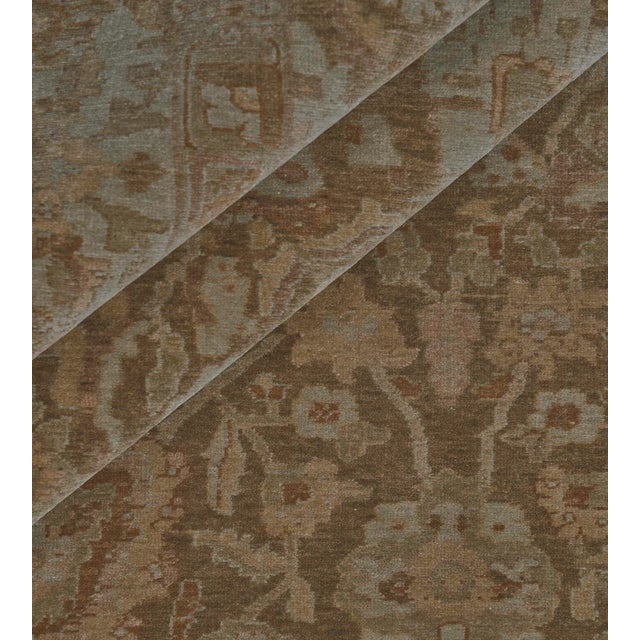 Skillfully created in Turkey, this beautiful Tabriz features a soothing almond color field and an exceptionally fine...