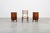 A sophisticated pair of Italian Art Deco nightstands from the 1920s, crafted in beautifully figured walnut and topped with...