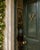 A charming 1970s cast brass door knocker modeled as a pair of crossed tennis rackets, complete with textured stringing and...