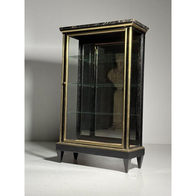 French Napoleon 3-piece display cabinet. Mid-19th century display cabinet / bookcase. Ebonized wood and finished all...