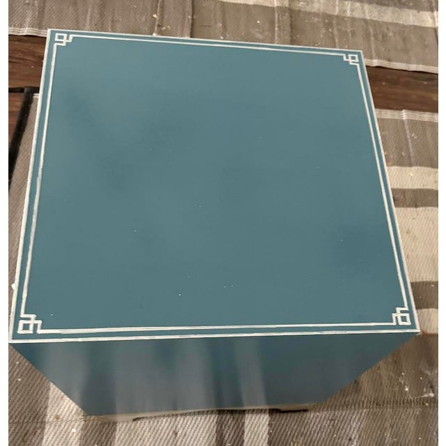 Add a pop of color with this beautifully finished cube side table. Place at the end of a sofa or next to a chair for your...