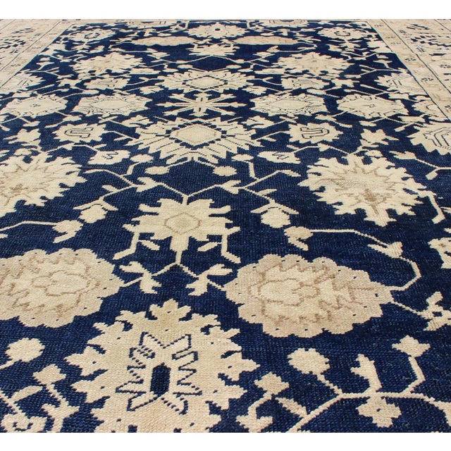 Mid 20th Century Turkish Oushak Rug With Floral Design in Dark Blue, Cream and Light Brown For Sale - Image 5 of 9