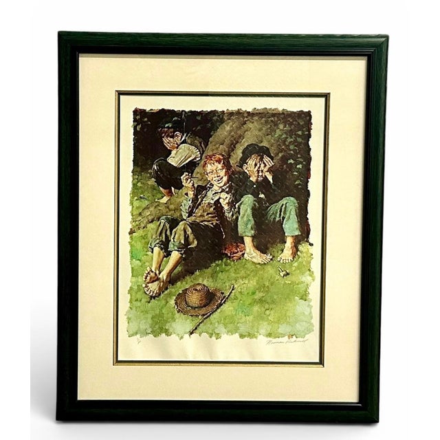 A hand-numbered 7/200 color collotype from Norman Rockwell’s celebrated Tom Sawyer Suite, professionally presented in its...