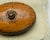 A charming vintage Hailo bed warmer, oval in form and sweetly plump, given a later hand-painted faux bois wood-grain...