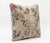 This beautiful 19'' x 19'' pillow cover was made from an authentic Turkish rug. Bright colors of wool adorn the front of...
