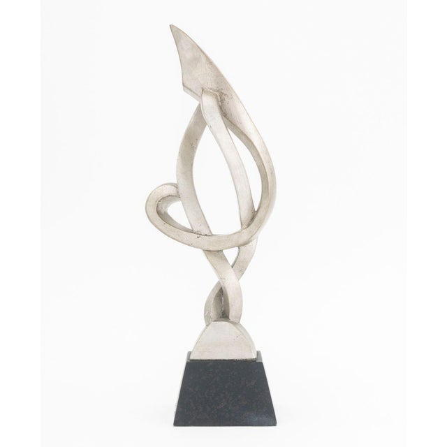 Modernist Silvered Composition Abstract Freeform Sculpture, on black base. Overall: 15" H x 5.25" W x 3.25" D. Provenance:...