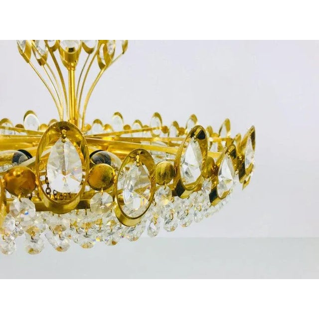 An extraordinary chandelier by Palwa made in Germany in the 1960s. The lamp has a very elegant design. It is made in the...
