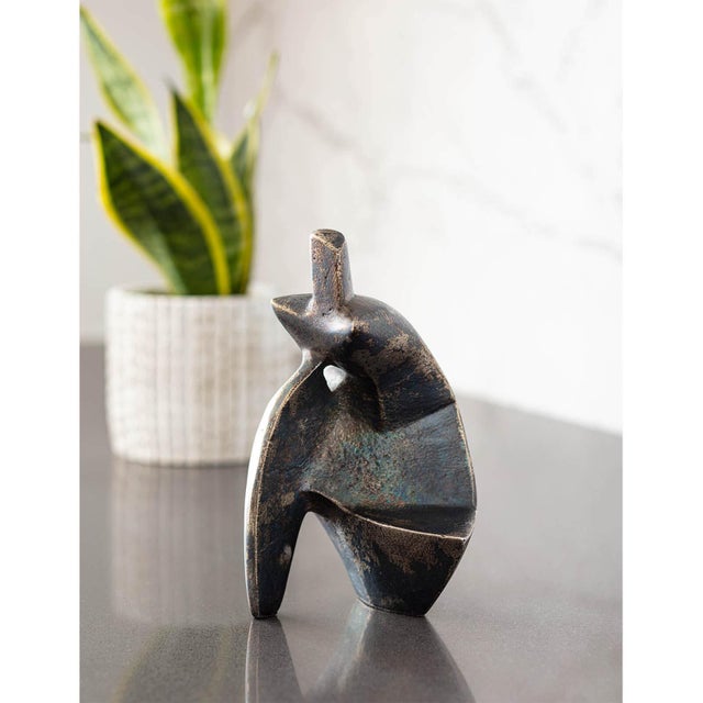 Contemporary sculpture shrunk down to the perfect scale for a table top, bookshelf or etagere. The Deity Sculpture is a...