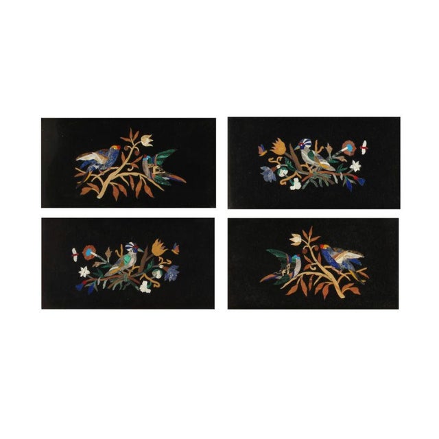 This exquisite set of four pietra dura plaques, arranged as two complementary pairs, showcases the timeless elegance of...