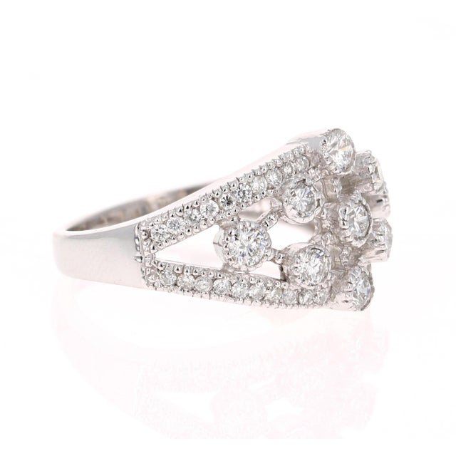 A simple cocktail/statement band. It has 49 Round Cut Diamonds that weigh 0.91 Carats. (Clarity: SI, Color: F) Very much...