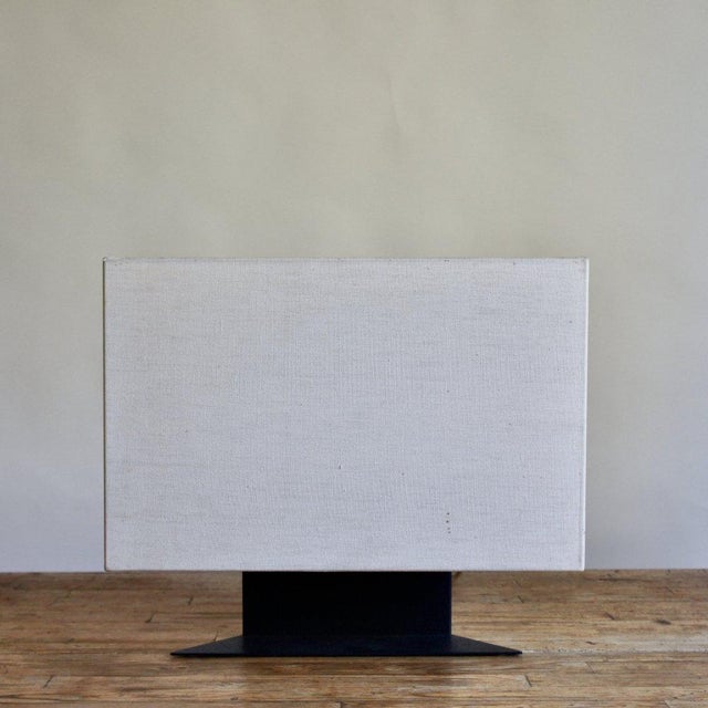 Triangle Shaped Table Lamp Designer: Cini Boeri Producer: Artimide Material: Black , Textile Dim.: 12"D x 22"W x 20"H...