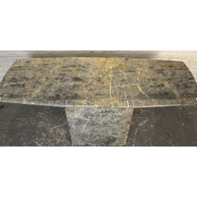 This stunning marble console table exudes class. It's made up of strong yet subtle lines with a streamlined top. Please...