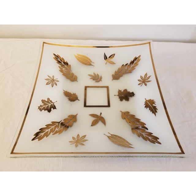 Gorgeous mid-century frosted glass tray by G. Reeves. Squared tray has a textured underside and 22k gold leaf detailing....