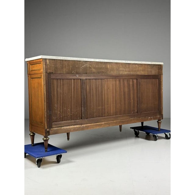French louis xvi style sideboard. Originally from france, early/mid 20th century. Crafted from mahogany. With a thick...