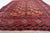 Immerse yourself in history with the Handmade Antique Afghan Baluch Rug from the 1920s. Design and Aesthetics: Dating back...