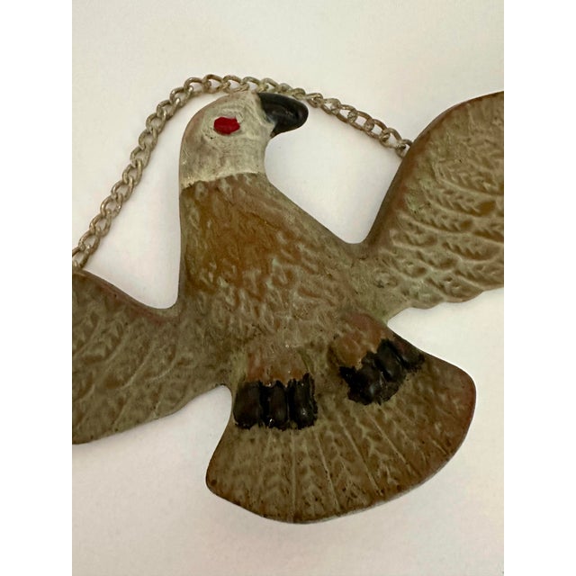 Vintage metal bald eagle wall hanging. Approximately from the 1950s–1970s. It appears to be cast or stamped metal with an...