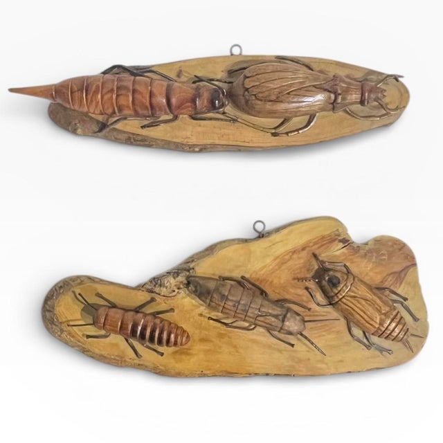 Set of 2 hand carved insects or bugs. Each panel is a cross section of wood with the insects attached with nails. Each bug...
