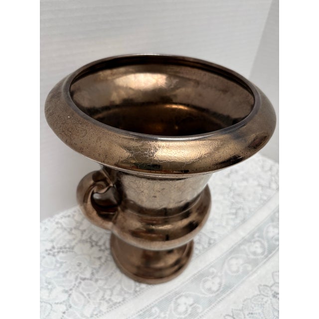 Vintage bronze toned crackle glazed large vessel or vase. Urn shaped with side loop handles and deep metallic finish.
