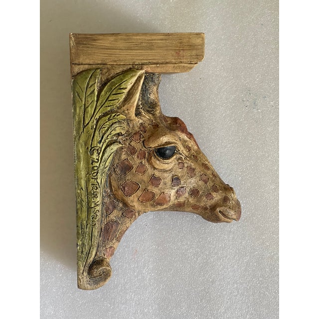 Mid 29 th c Figural sculptural safari giraffe wall bracket.