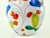 This vintage Italian ceramic vase is a vibrant display of hand-painted craftsmanship. Adorned with colorful floral and...
