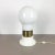 Giant bulb light, origin Italy, 1970s. Original 1970s giant glass bulb table light. The base and middle of this light are...