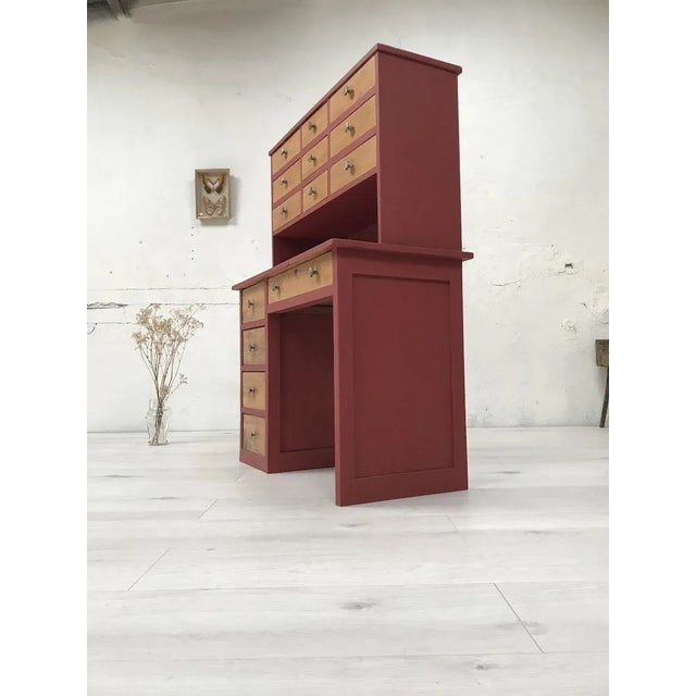 Vintage wood and painted veneer desk with 14 drawers. This workshop furniture type desk will be ideal for your many...