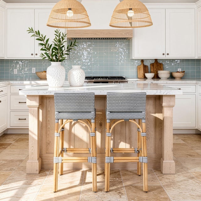 Combining clean lines with tropical materials, this Butler Specialty Company low back bar stool brings modern island charm...