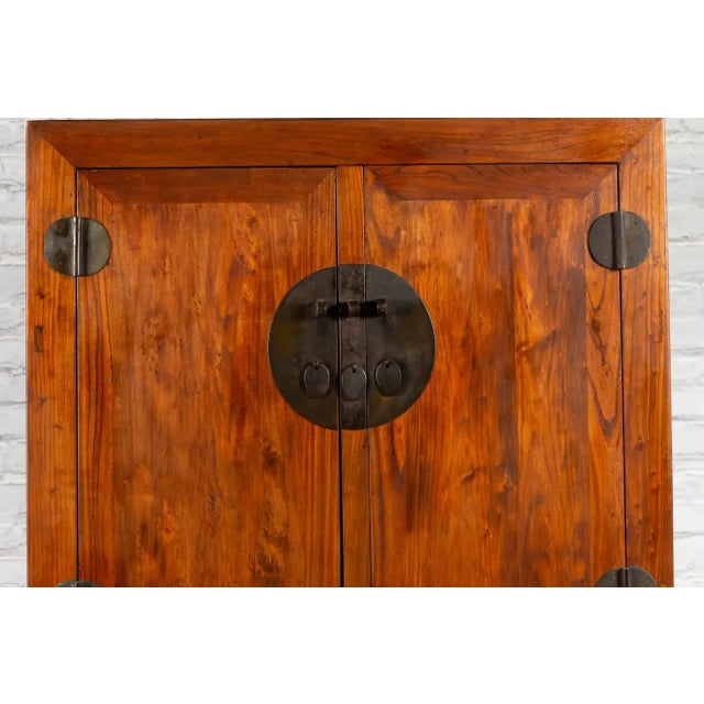 Chinese Qing Dynasty 19th Century Armoire with Carved Skirt and Large Medallion For Sale - Image 11 of 13