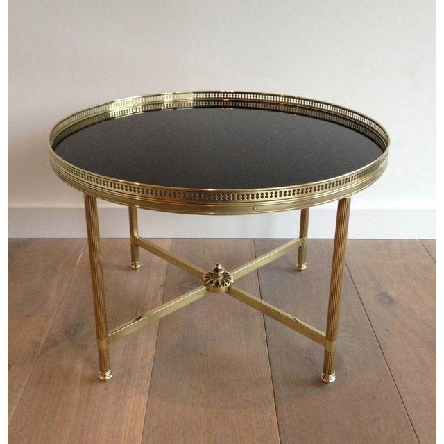 Neoclassical 1940s Round brass coffee table with black lacquered glass top Attributed to Maison Jansen For Sale - Image 3 of 9