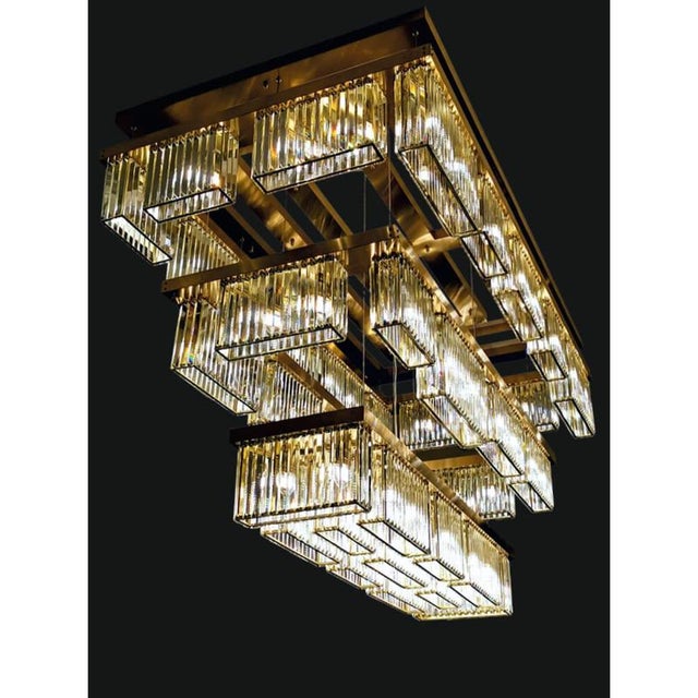 Collection labirinto chandelier, metal and crystal, ncs 190/3/200 by jago dimensions: d 200*100 x h 40-120 cm. Materials:...
