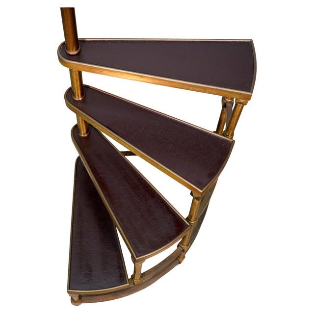 This spiral library step ladder is an ideal conversation piece to enhance any space. With a semi-circular design and four...