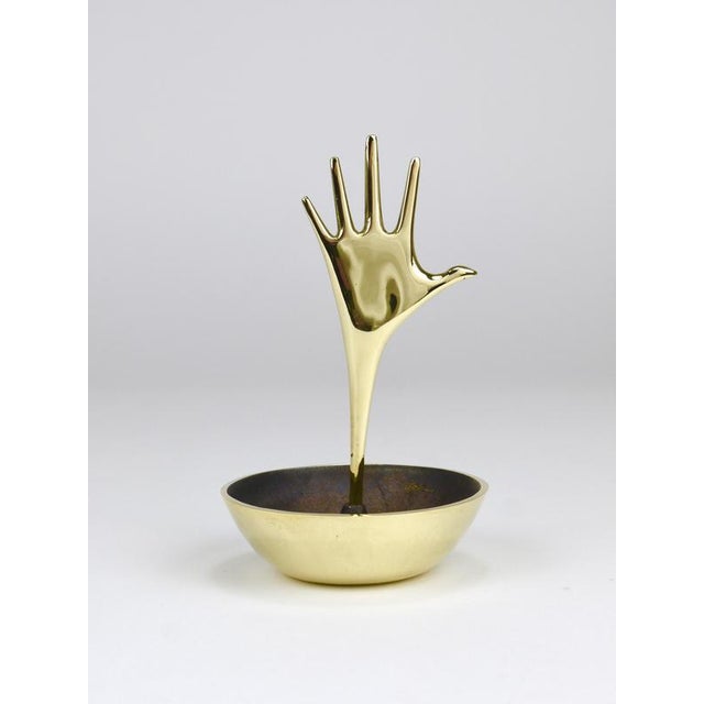 A beautiful Catch-All storage utility bowl, model number 4209, designed by Carl Auböck IV and traditionally handcrafted by...