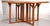 20th century, the top in laminated cherry with cruciform design, with brass line and cherry inset inlay, on an open X form...