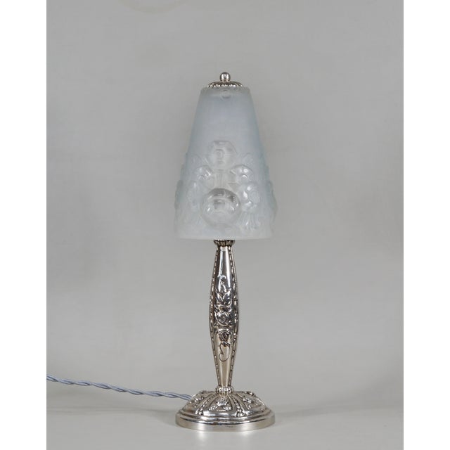 Muller frères A beautiful French art deco table lamp made around 1925-1930. The nickel-plated base in solid brass or...