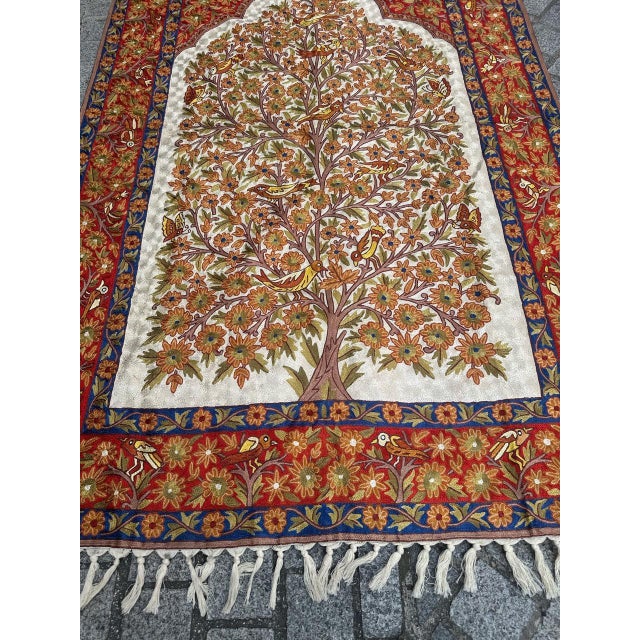 Stunning handmade Indian silk embroidered wall hanging featuring the iconic “Tree of Life” motif. Richly decorated with...