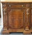 Impressive grand-scale sideboard featuring a richly warm wood finish and beautifully carved European-inspired detailing....