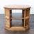 This classic octagonal end table features a warm wood finish and paneled sides. The spacious inlaid tabletop and open...