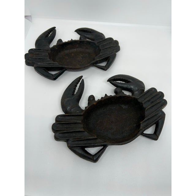 Antique cast iron crab ashtrays can be used for a catchall or an ashtray. Very heavy cast iron.