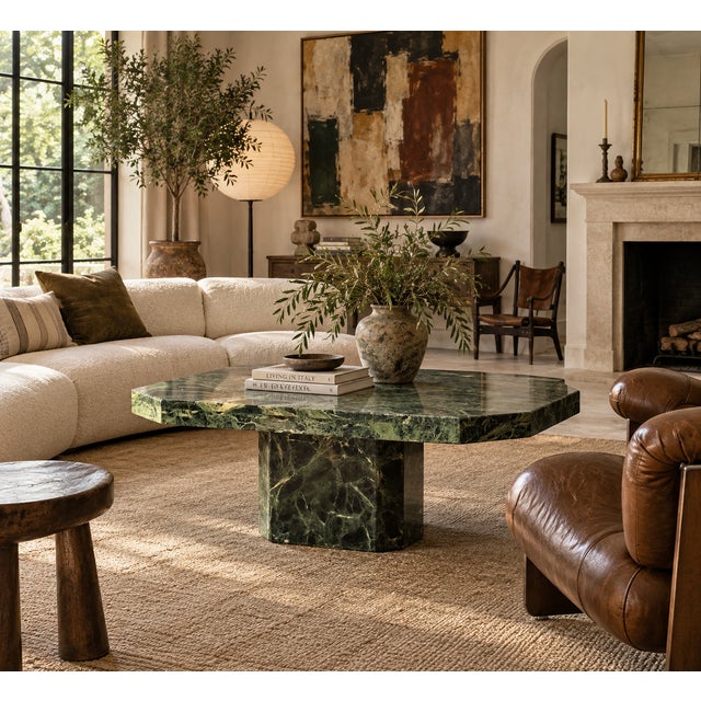 Crafted entirely from richly veined Verde Alpi marble, this vintage coffee table pairs monumental proportions with the...