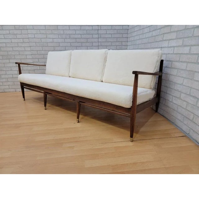 Century Modern Danish Walnut Frame Sofa by Ib Kofod-Larsen Newly Reupholstered in a High End Ivory Sheep's Wool Shearling...