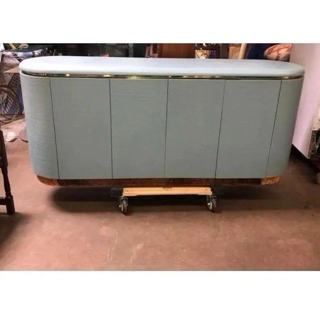 1970s glam curved “pill” buffet credenza by Mastercraft. Missing label but research online very closely aligns with...