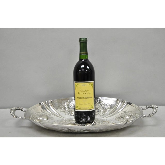 Antique English Victorian Silver Plated Fruit Harvest Repousse Centerpiece Fruit Bowl. Circa Early 20th Century....