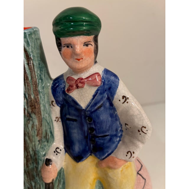 A good original Staffordshire flat back figurine entitled '' Young Tom Morris'' in mint condition with no chips or cracks....