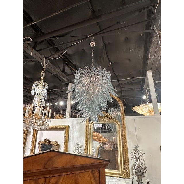 Exquisite modern aqua blue palm leaf Murano glass chandelier. A glistening beauty that creates a huge impact. Gorgeous!!...
